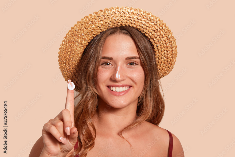 Woman using a natural cosmetic product