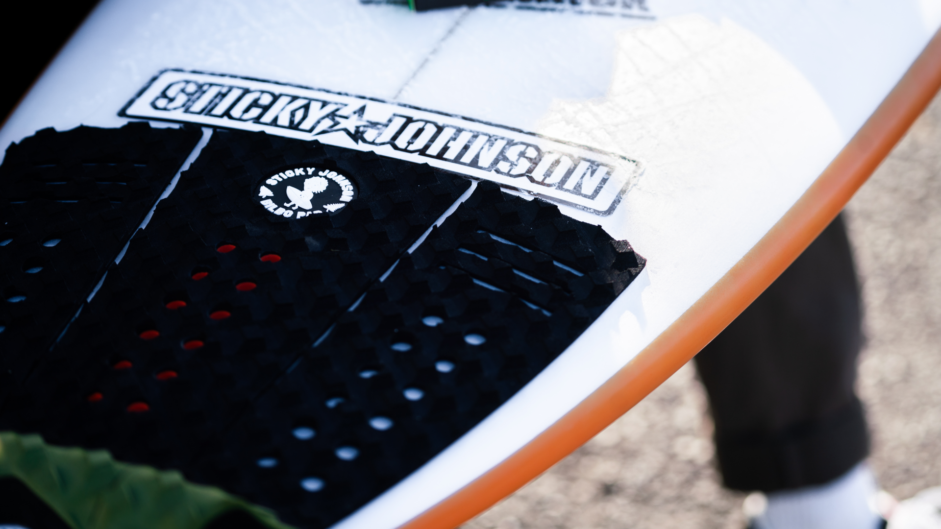 Sticky Johnson grip pad on a surfboard